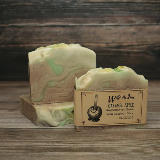 picture of soap with green, brown, and cream colored swirls with green glitter on top