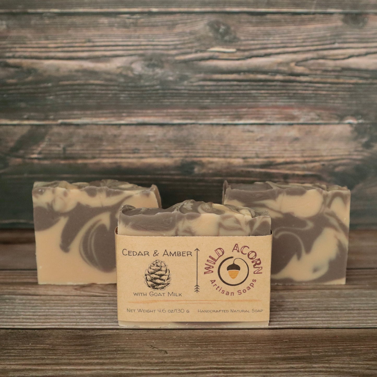 picture of soap with brown and cream colored swirls with slight swirl on top for design