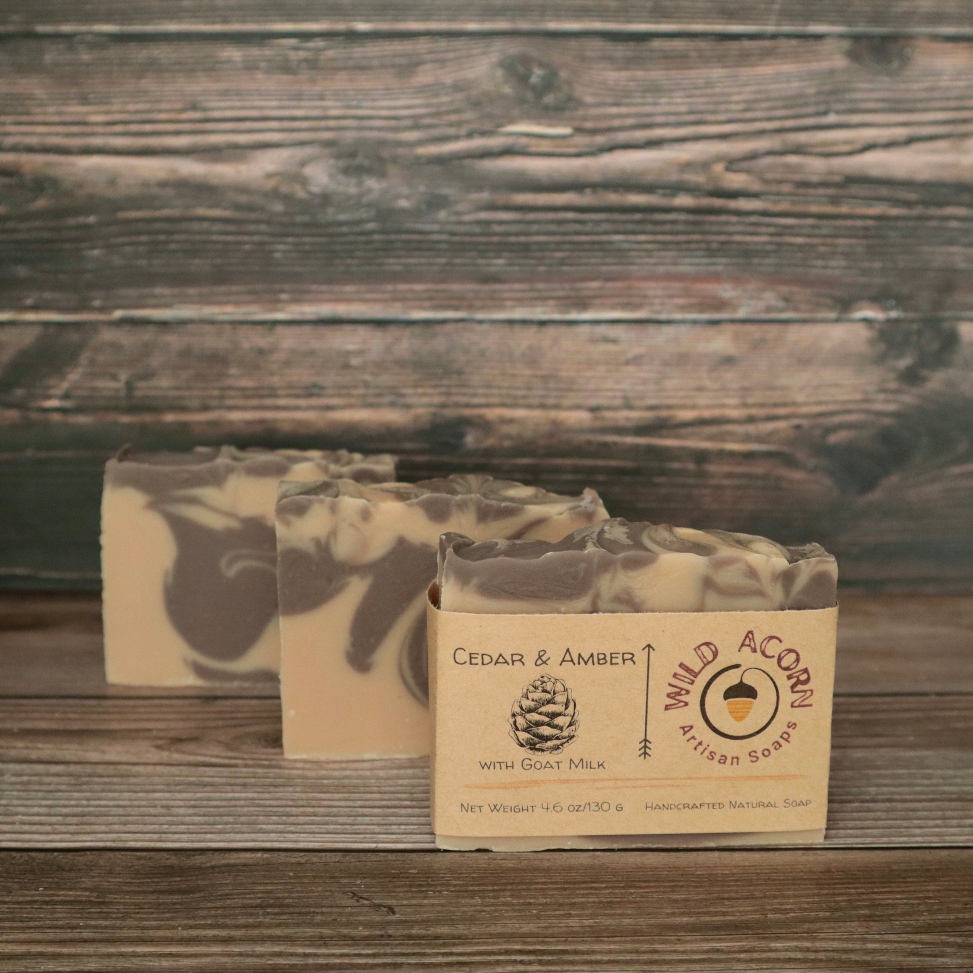 picture of soap with brown and cream colored swirls with slight swirl on top for design