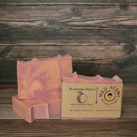 picture of soap with pink and peach colored swirls with slight ridges on top for detail