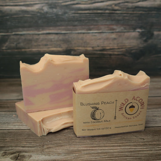 picture of soap with pink and light pink/peach colored swirls 