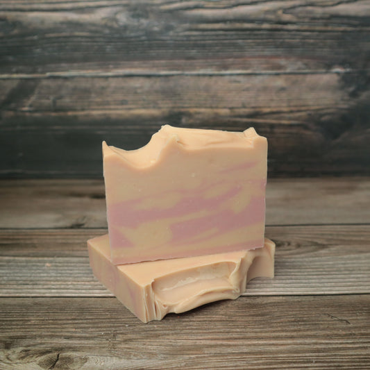 picture of soap with pink and light pink/peach coloredswirls 